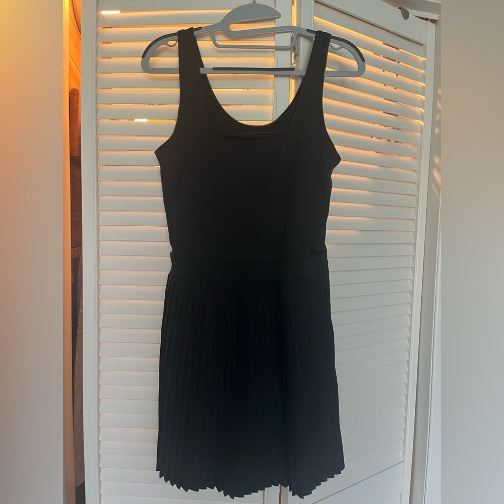All in Motion Black Pleated Mini Dress